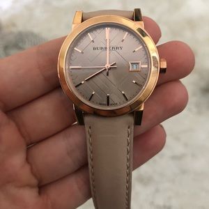 Burberry women’s rose gold watch with nude strap